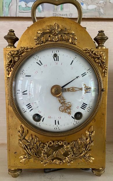 null An ormolu and chased bronze OFFICER'S CLOCK with foliage decoration, the dial...