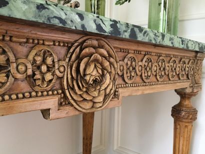  A Pair of CONSOLES in natural wood, moulded and carved with flowers and interlacing...