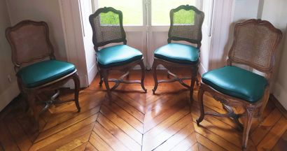 null SET OF FOUR WOODEN CHAIRS, moulded and carved with flowers. Backrest. Arched...