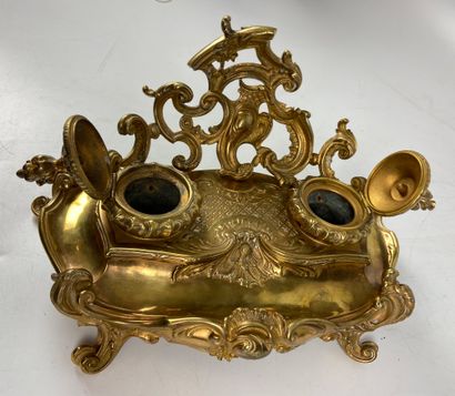 null An ormolu and chiselled ormolu writing case with two covered cups. Louis XV...