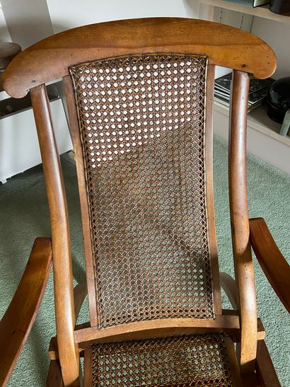null FOLDING CHAIR with curved openwork back, in natural wood, the armrests moved,...