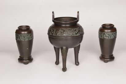 null VIETNAM, 20TH CENTURY

Set comprising a tripod incense burner and two vases,...