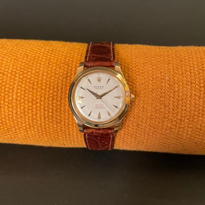 null ROLEX PERPETUAL FRENCH CASE. Ref : 9351. Circa 1960. Pink gold bracelet watch...