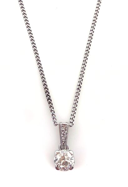 null PENDANT holding a diamond weighing approximately 1.10 carats. The hanger is...