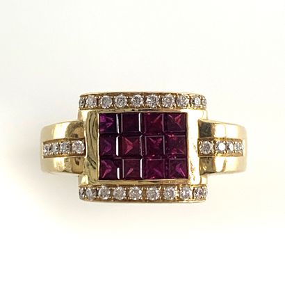 null RING set with a rectangle of rubies in a mysterious setting surrounded by brilliant-cut...
