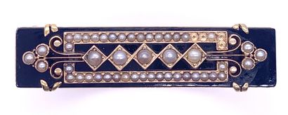 null 
NAPOLEON III

BRACELET

decorated with a rectangle of onyx with a geometrical...