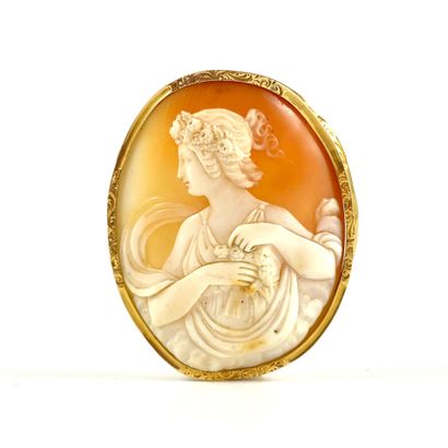 A cameo on agate with a woman in profile....