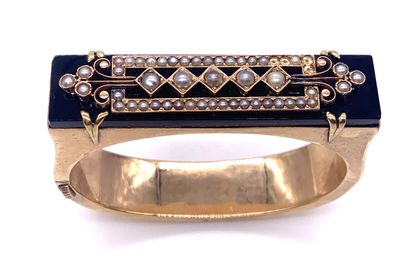 null 
NAPOLEON III

BRACELET

decorated with a rectangle of onyx with a geometrical...