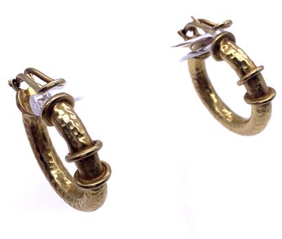 null 
PAIR OF CREOLES

decorated with a hammered cylinder. Mounted in 14K yellow...