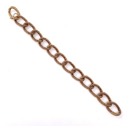 null VAN CLEEF & ARPELS BRACELET composed of a curb chain. 18K yellow gold setting....
