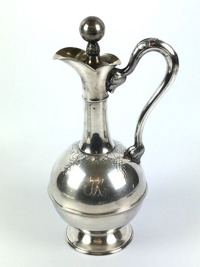 Large silver WINE JUG chased on the body...