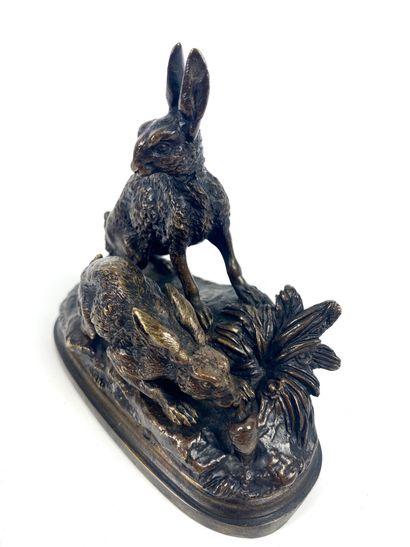  Jules MOIGNIEZ (1835-1894) Deux lapins Bronze à patine brune signé sur la terrasse...