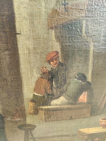  ECOLE FLAMANDE DU XVIIème siècle Scène de taverne Huile sur toile 53 x 80 cm (d...