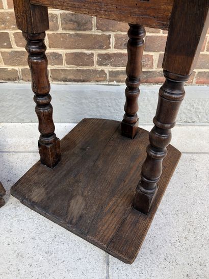 null PAIR OF TABOURETS in oak with gondola back. They stand on three baluster feet...
