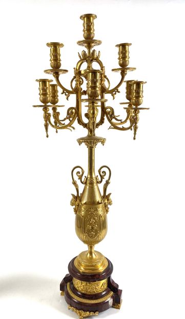  An important PAIR OF CANDELABRES in gilt bronze and red marble. The ormolu pedestal...