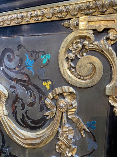 null An ebony veneered sideboard with rich ornamentation of gilded and chased bronzes...
