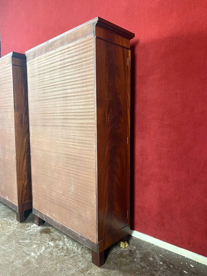 null Pair of mahogany and mahogany veneer cardboard boxes opening in front by fourteen...