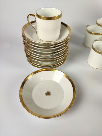null PARIS TEA SET in white and gold porcelain including: - A teapot - A sugar bowl...