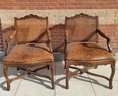 null PAIR OF ARMCHAIRS with cane base in natural wood, moulded and carved with flowers...