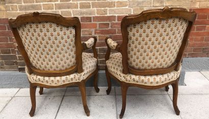 null A PAIR OF CABRIOLET CHAIRS in natural wood, moulded and carved with flowers,...
