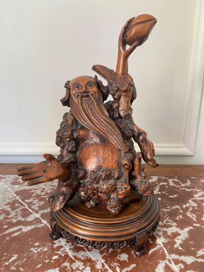 null CHINA Carved wood group representing Shoulao. Height : 38 cm (Accidents and...