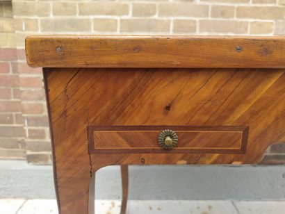 null TRIC TRAC in veneer and marquetry opening in the waist by two drawers, and two...