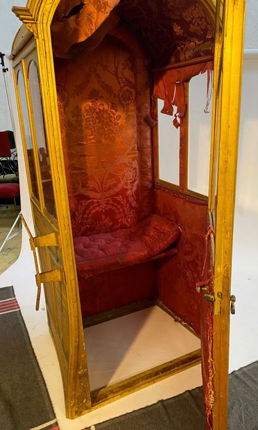 null Wooden chair with a door partly glazed. inside red silk (in the state) Beginning...