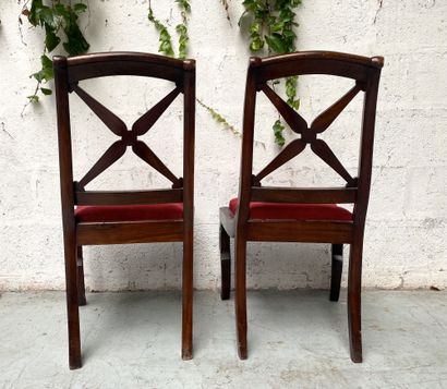 null Pair of mahogany chairs with a flat openwork back decorated with a spray of...