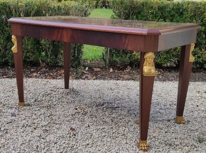 null Mahogany LOW TABLE of rectangular shape and resting on four legs with cariatid...