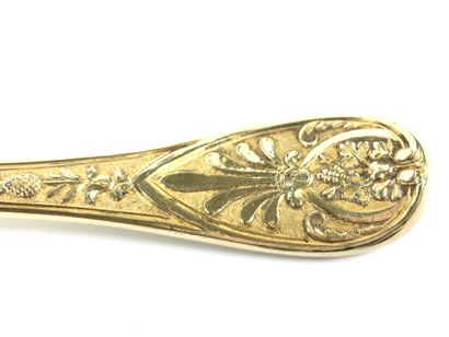 null Suite of SIX GOLDEN DESSERT SPoons with antique decoration. Red morocco case....