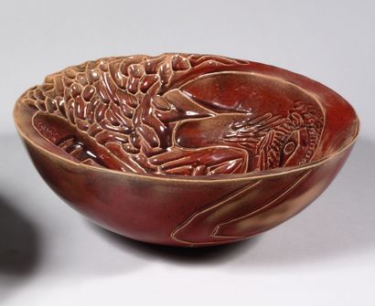 null FLAVIE VAN DER STIGGHEL (Born in 1984) Large red glazed ceramic bowl with stylised...
