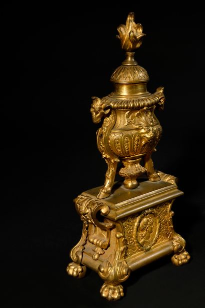null A PAIR OF SMALL ormolu CHENETS in the taste of André-Charles Boulle, with cassolette,...