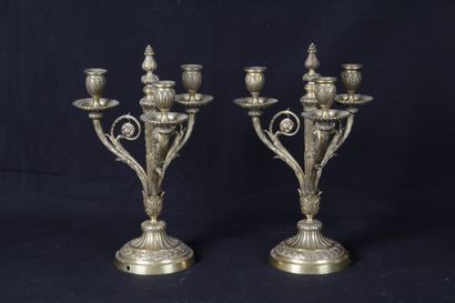 null Pair of Louis XVI style candelabras, with three arms of light, in sculpted bronze,...