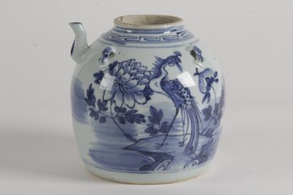 null CHINA, C. 1900 Small blue-white porcelain water jar decorated with a phoenix...