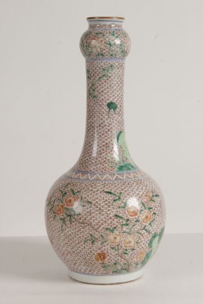 null China, 20th century A green family style porcelain and enamel vase with a spherical...