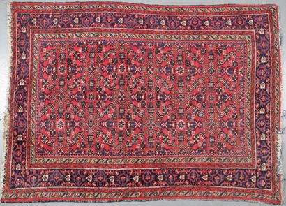 KARABAGH CARPET Brick red field with stylized...