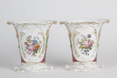 null A PAIR OF MARY VASES, in porcelain of Paris with polychrome and gilded decoration...