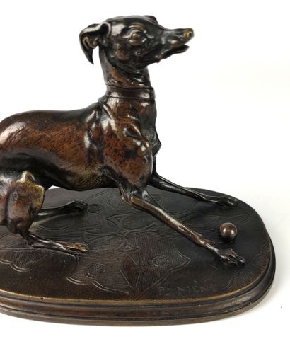 null Pierre-Jules MENE (1810-1879) Greyhound with a ball Bronze with light brown...