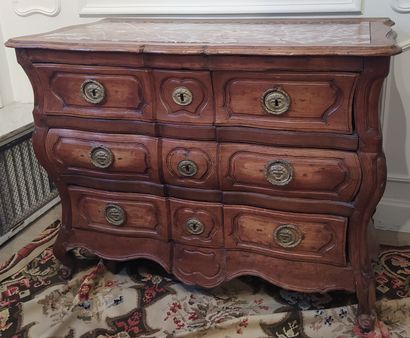 null WOODEN COMMODE with curved sides and front opening on the front with five drawers...