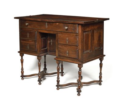 null MAZARIN DESKTOP in natural wood opening in front of four drawers framing a central...