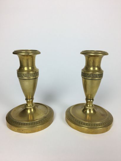 Pair of gilt bronze corkscrews with a chiselled...