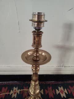 null Pair of large bronze candlesticks, turned shafts, cups, high bases with steps,...