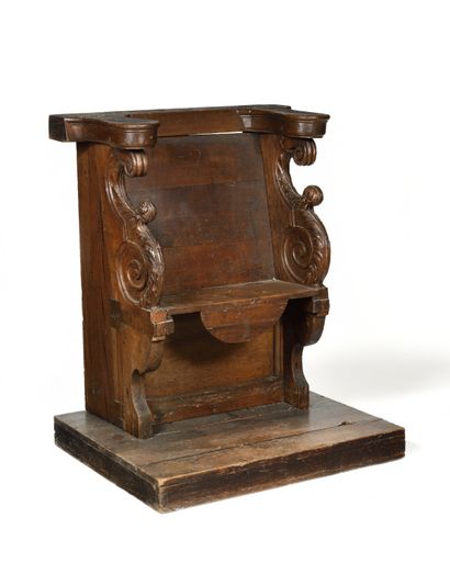 null STALLE in carved oak resting on a platform, mercy in base carved with foliage,...