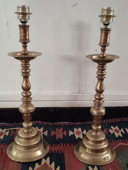  Pair of large bronze candlesticks, turned shafts, cups, high bases with steps, WB...