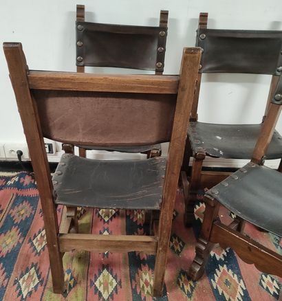 null SET OF FOUR WALNUT CHAIRS with leather back and seat, moulded front legs resting...