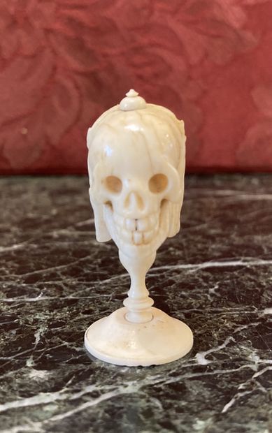 null A carved ivory CHAPELET with a double face of Christ and Death, on a 19th century...