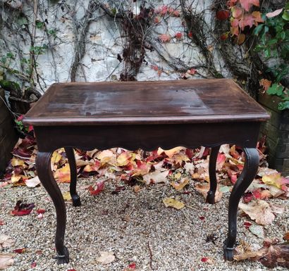 null Walnut writing table opening with a drawer in the waist, the notched belt, it...