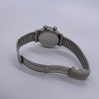 null LIP NAUTIC-SKI. CIRCA 1970. Steel bracelet watch, round case, black dial signed....