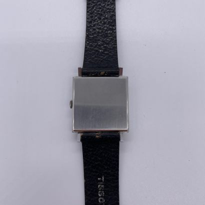null TISSOT CIRCA 1970. Steel bracelet watch, square case. Cream dial. Painted baton...