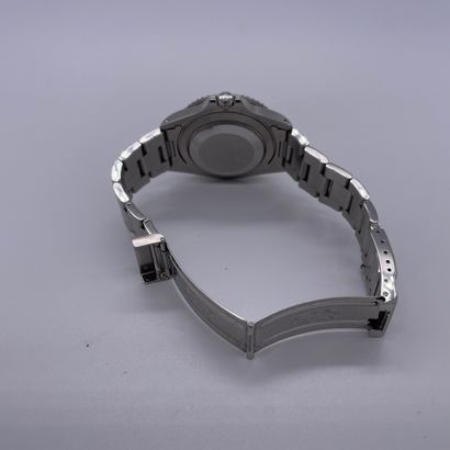 null ROLEX GMT-MASTER II "Coke" Ref. 16710. circa 1998. N° U584XXX. Steel wristwatch...